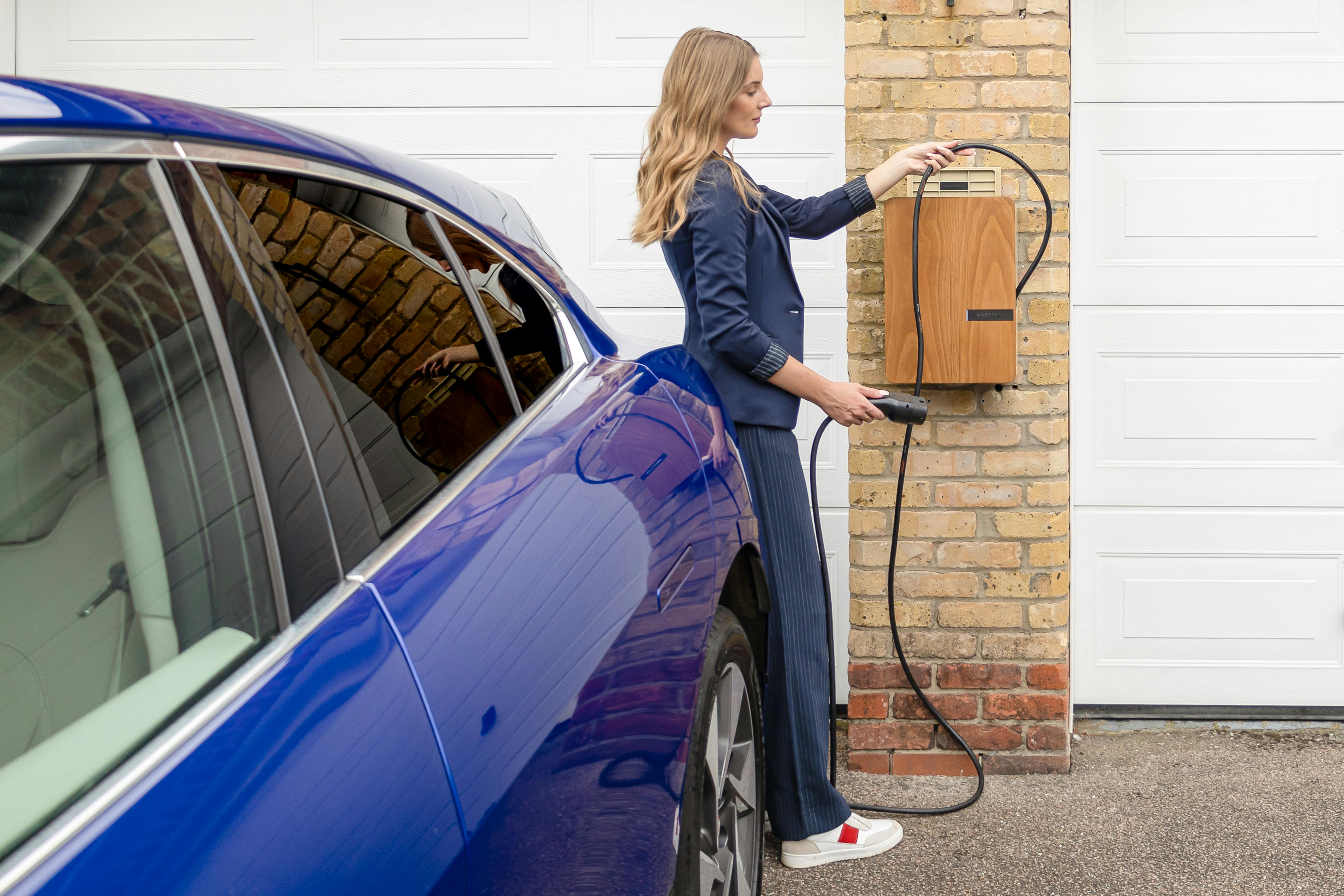 Woman docking her ev charger